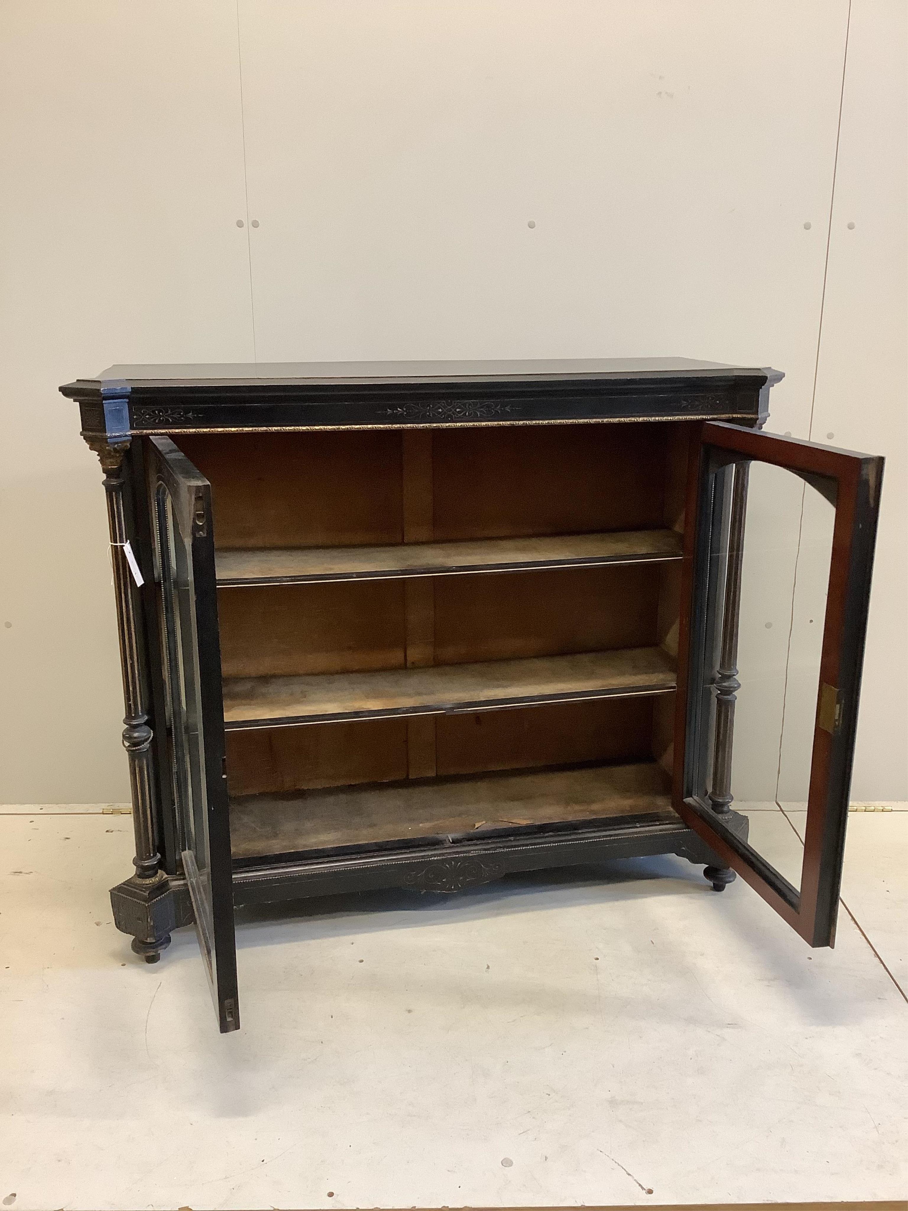 A late Victorian gilt metal mounted ebonised pier cabinet, width 124cm, depth 39cm, height 106cm. Condition - fair